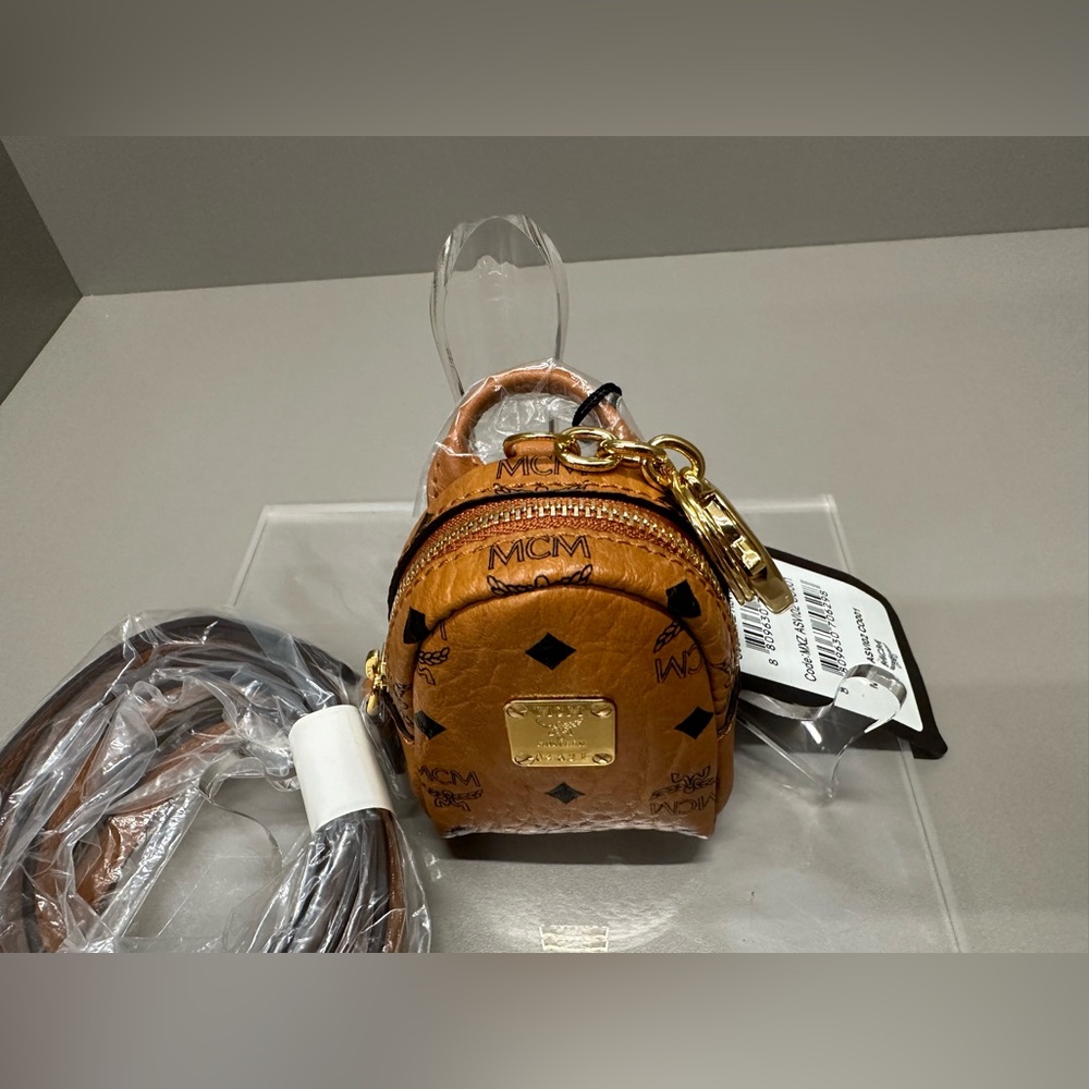MCM MICRO BACKPACK WITH CROSSBODY STRAP. Can also be used as a bag charm. NWT - Picture 9 of 10